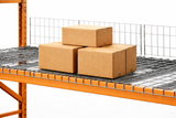 Three cardboard boxes stacked on a metal shelving unit with an orange frame.